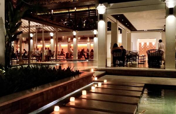 Bambu Restaurant Seminyak: Betutu Duck in Open Pavilions by the Koi Pond